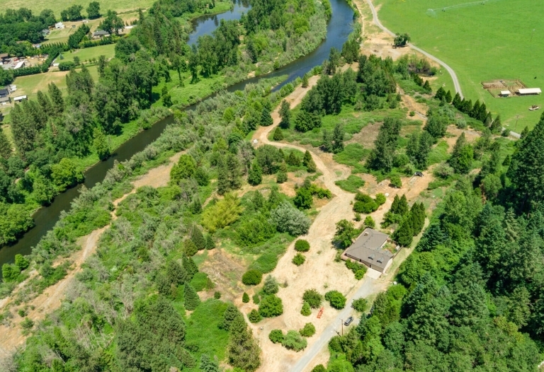 FOUR SEPARATE TAX LOTS ON 26 ACRES OF APPLEGATE RIVER FRONTAGE